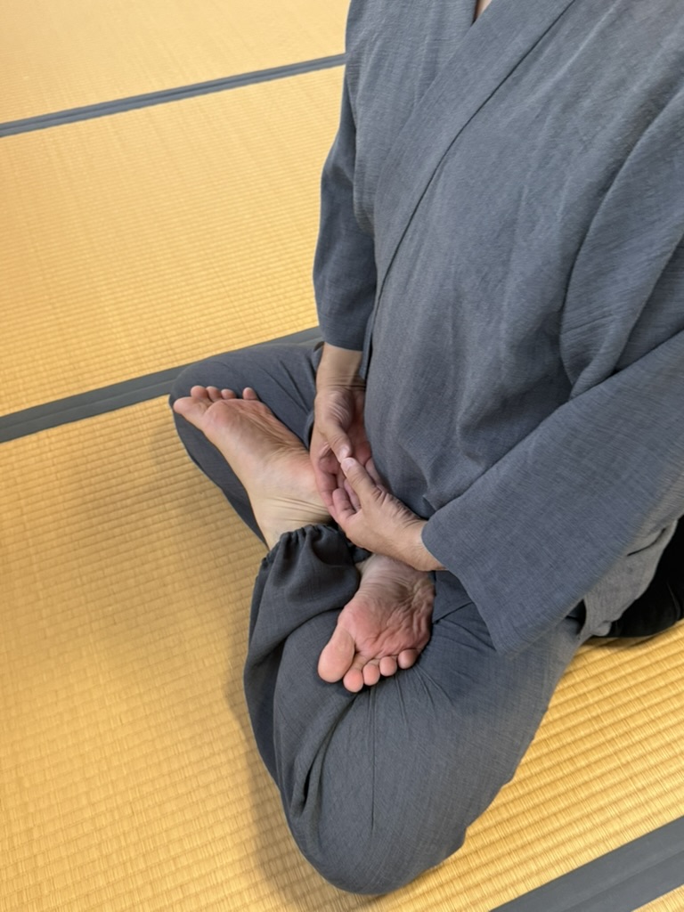 Close-up of Hokkaijoin Cosmic Mudra hand position