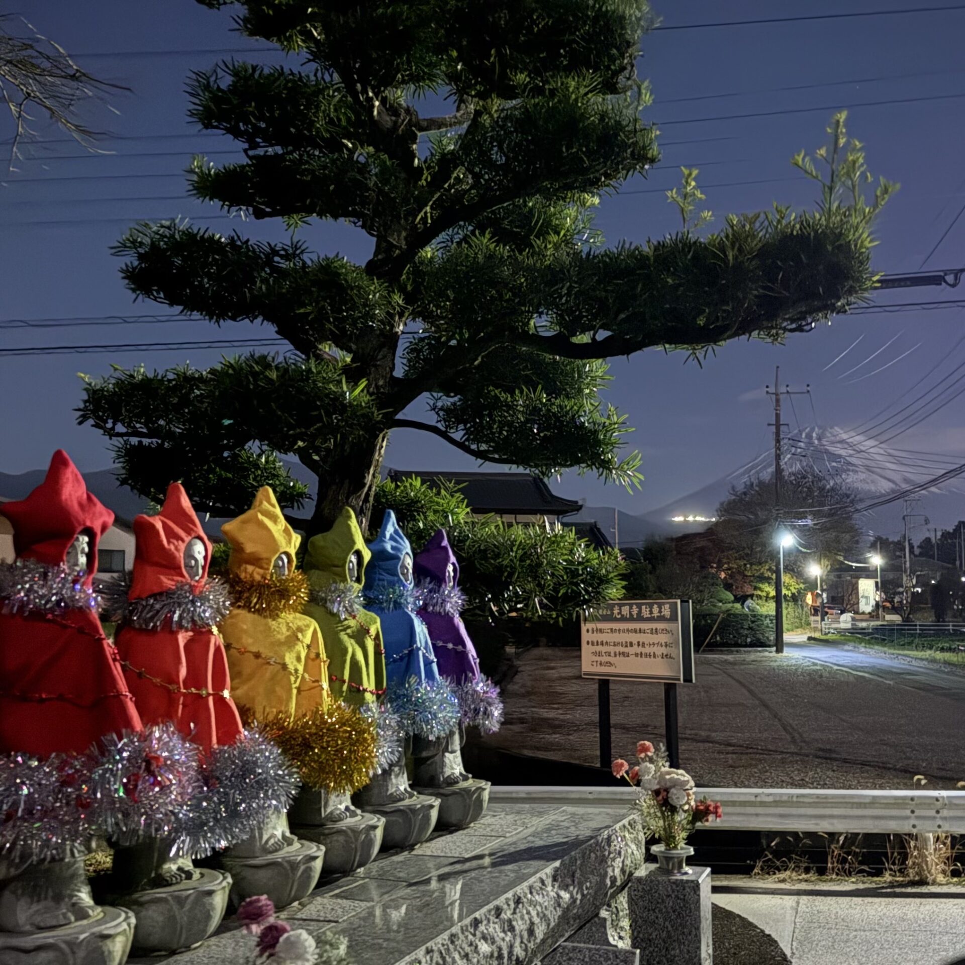 Six Jizo statues in Christmas clothing at Komyoji Temple